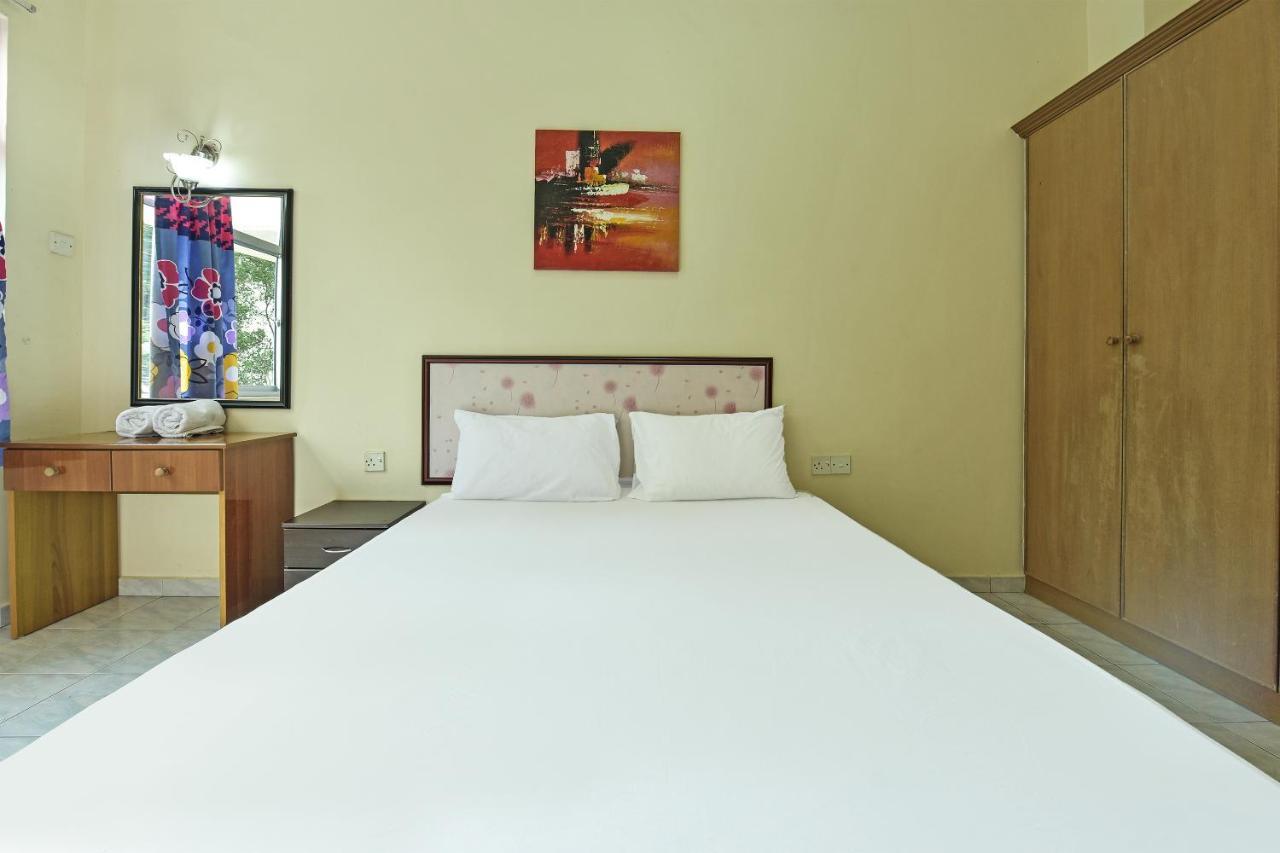 Oyo Home 90700 Teluk Batik Holiday Apartment Kampong Telok Batu Экстерьер фото