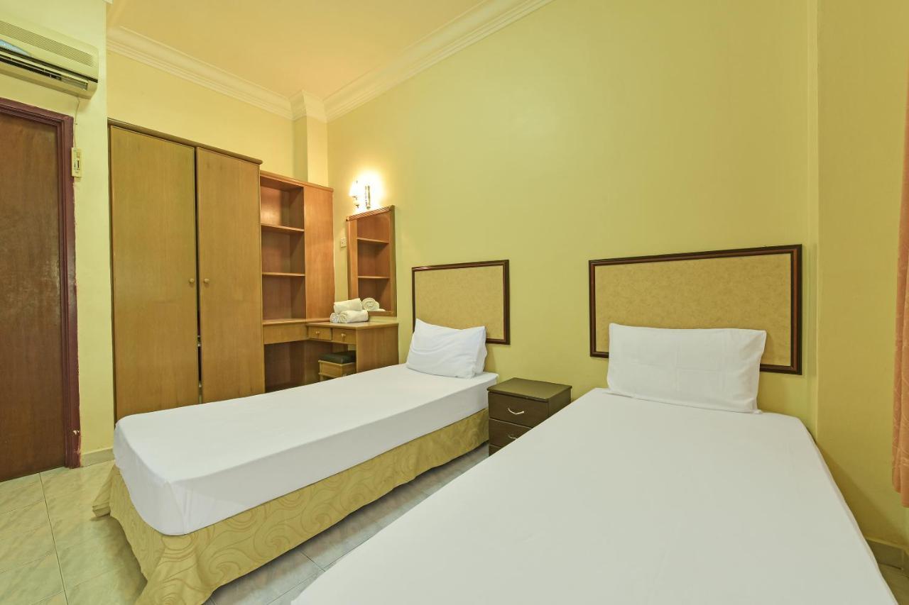Oyo Home 90700 Teluk Batik Holiday Apartment Kampong Telok Batu Экстерьер фото