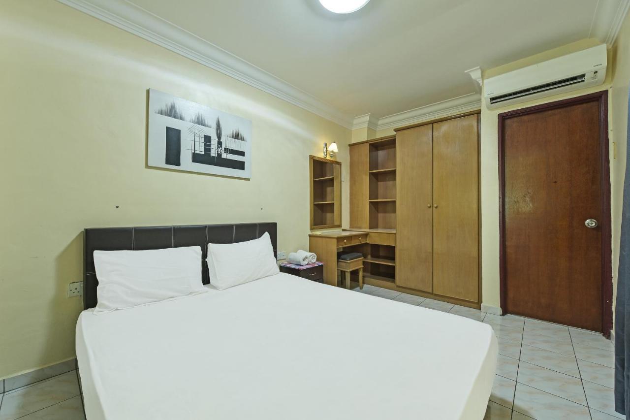 Oyo Home 90700 Teluk Batik Holiday Apartment Kampong Telok Batu Экстерьер фото