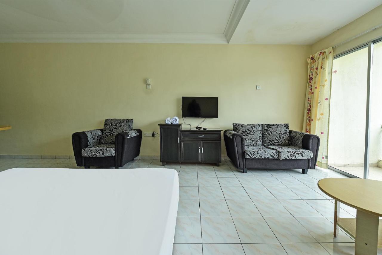 Oyo Home 90700 Teluk Batik Holiday Apartment Kampong Telok Batu Экстерьер фото