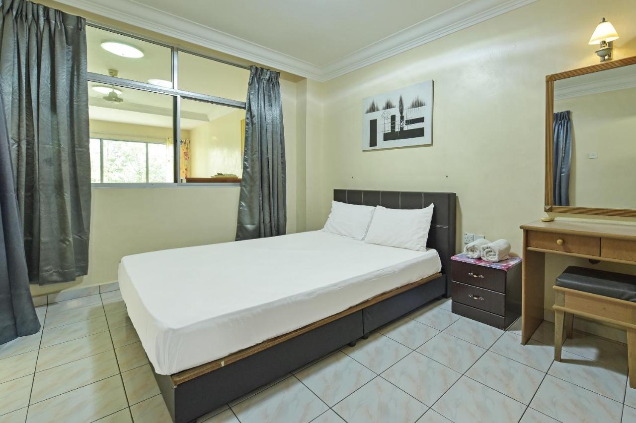Oyo Home 90700 Teluk Batik Holiday Apartment Kampong Telok Batu Экстерьер фото