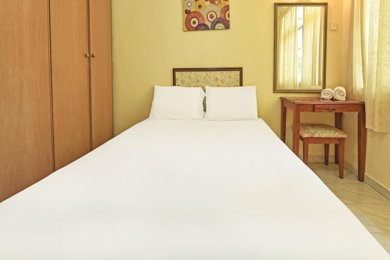 Oyo Home 90700 Teluk Batik Holiday Apartment Kampong Telok Batu Экстерьер фото