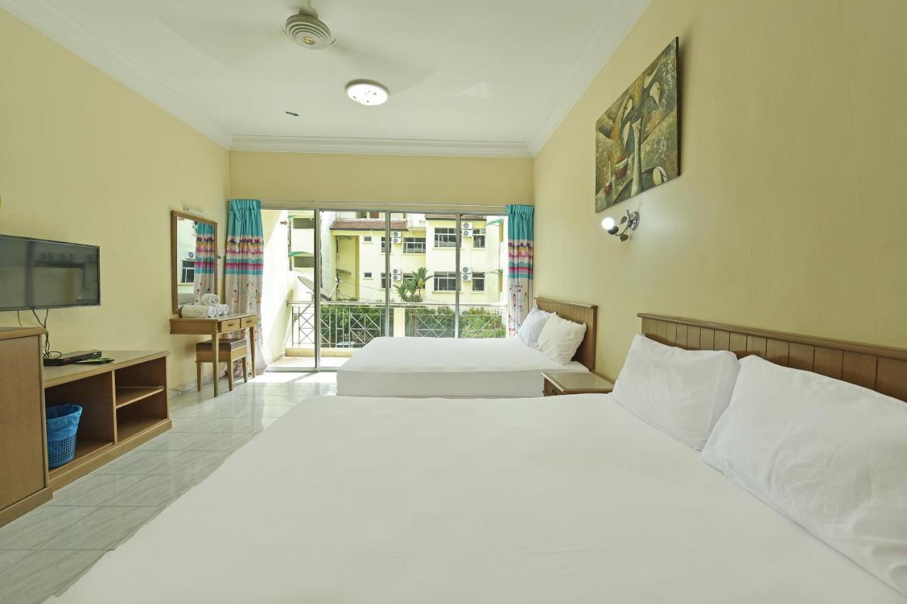 Oyo Home 90700 Teluk Batik Holiday Apartment Kampong Telok Batu Экстерьер фото