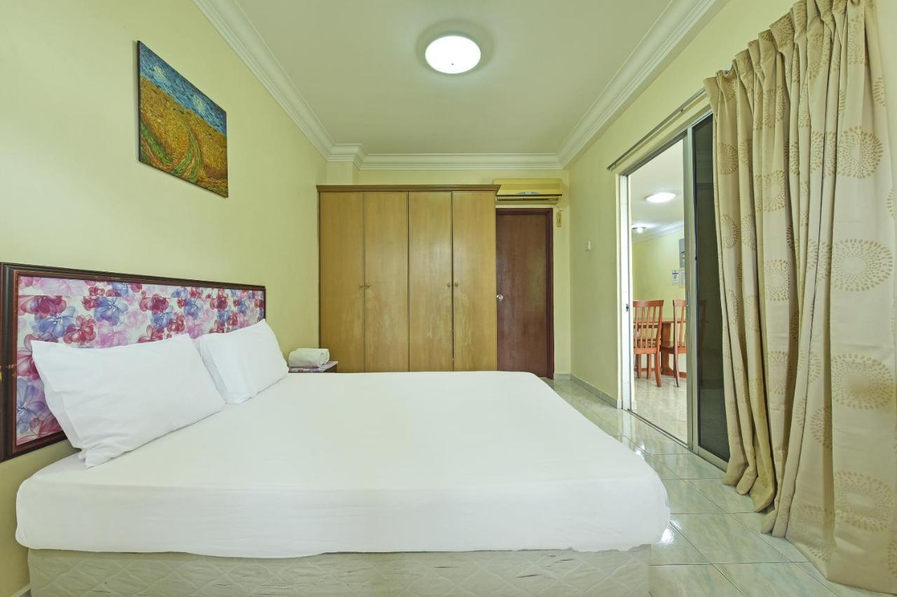Oyo Home 90700 Teluk Batik Holiday Apartment Kampong Telok Batu Экстерьер фото
