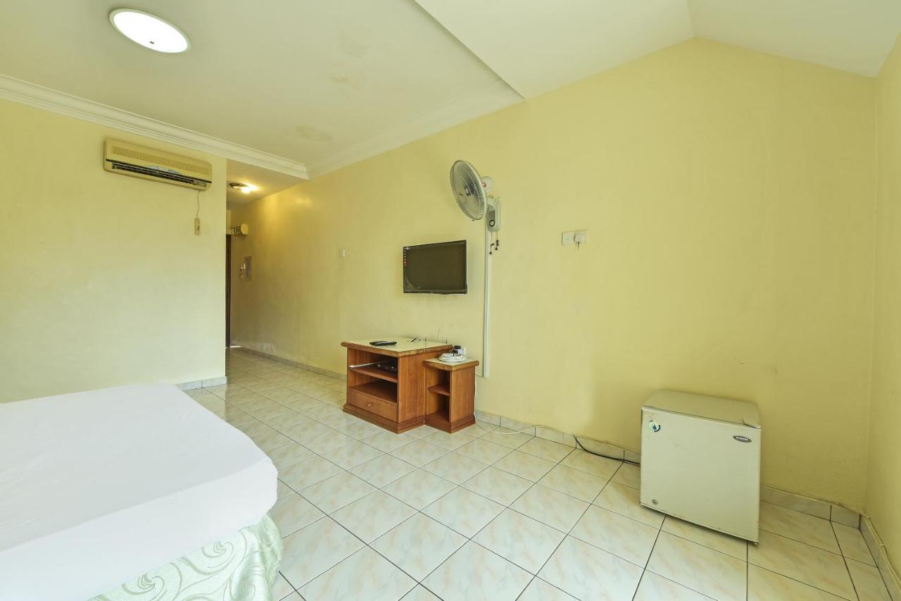 Oyo Home 90700 Teluk Batik Holiday Apartment Kampong Telok Batu Экстерьер фото